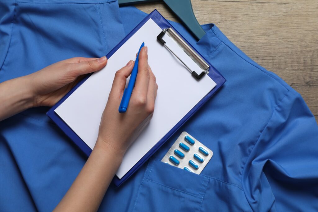 Medical card in the hands of a doctor